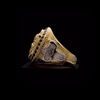 Japanese handcrafted solid 18K gold lion ring side view featuring two-tone detailing and black gemstones