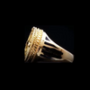 Japanese solid 18K gold leopard ring side view featuring black enamel accents and detailed gold setting