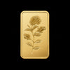 PAMP Suisse 10g Rosa gold minted bar featuring embossed rose design on black background